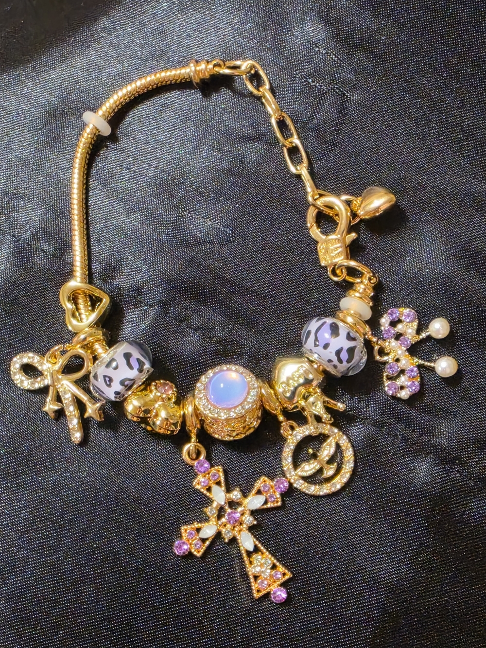 Gold Charm Bracelet with Purple Accents and White Leopard Beads